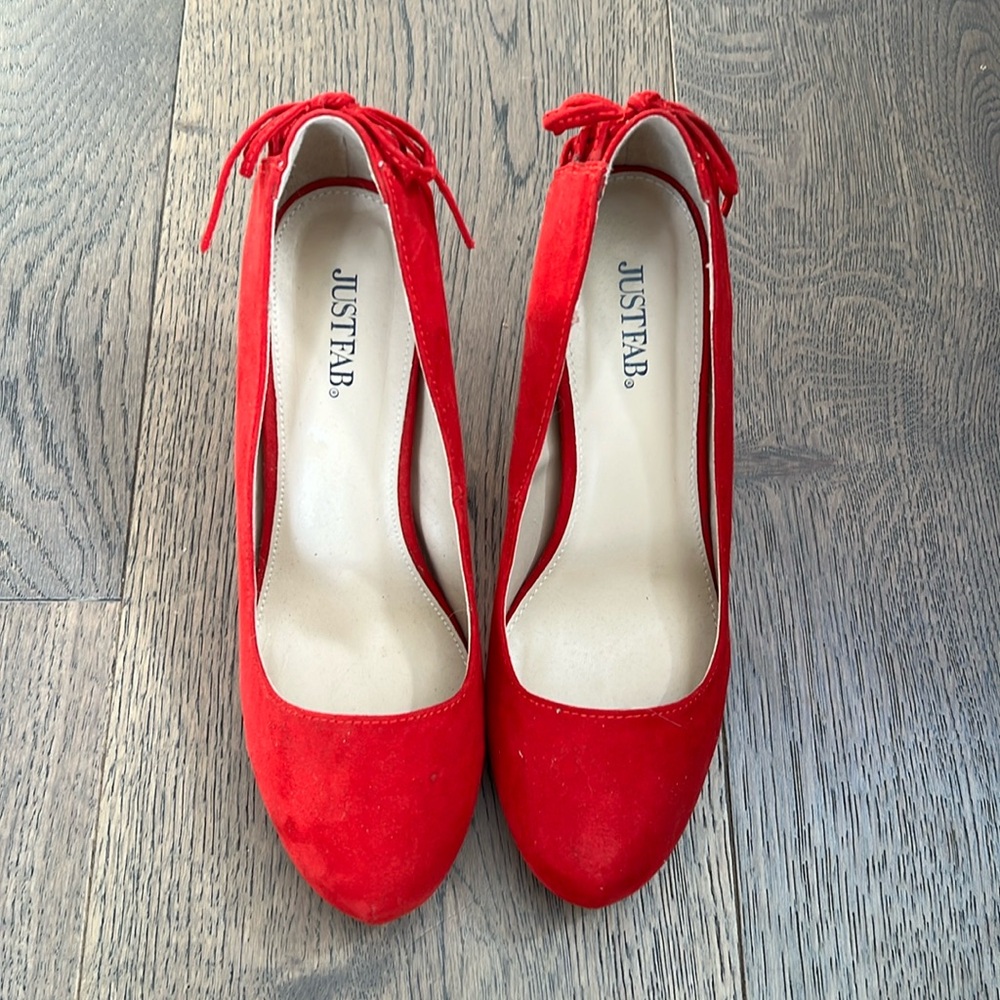 Red suede heels with lace up back